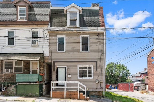 302 38th St, Lawrenceville, PA 15201 - view of property with roof with shingles and mansard roof