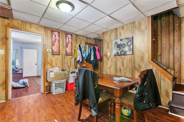 1807 Packer, Mckeesport, PA 15132 - dining area featuring a paneled ceiling, wooden walls, and wood finished floors