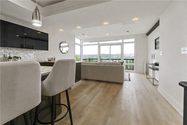 2613 Stella St, South Side, PA 15203 - living area featuring light wood-style flooring and recessed lighting