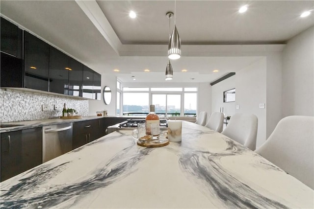 2613 Stella St, South Side, PA 15203 - kitchen featuring appliances with stainless steel finishes, modern cabinets, decorative backsplash, recessed lighting, and hanging light fixtures