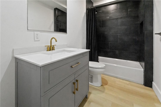2613 Stella St, South Side, PA 15203 - full bathroom featuring wood finished floors, vanity, and shower / bathtub combination with curtain