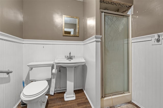 1345 N Tower Rd, Perry Twp, PA 16123 - full bathroom featuring wainscoting, a shower stall, and wood finished floors