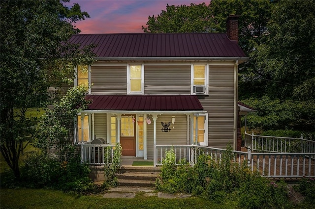 1345 N Tower Rd, Perry Twp, PA 16123 - view of front of home with a metal roof, a chimney, and a porch