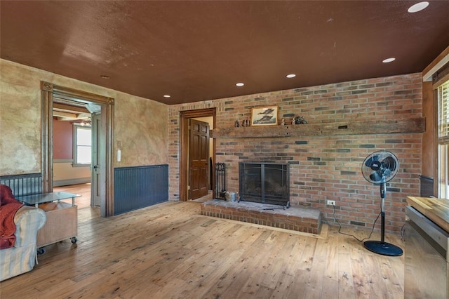 1345 N Tower Rd, Perry Twp, PA 16123 - unfurnished living room with a fireplace, hardwood / wood-style flooring, and recessed lighting