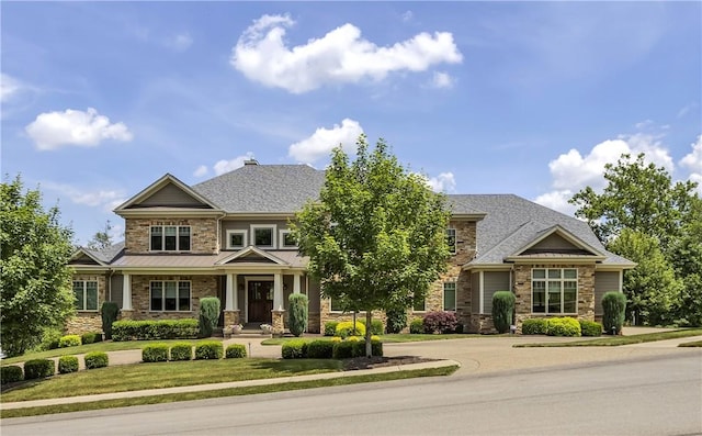 106 Orchard Dr, Pine Twp, PA 15044 - craftsman-style home featuring stone siding and a front lawn