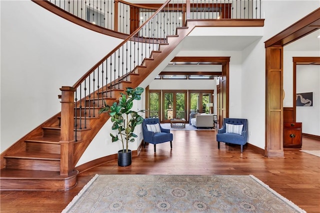 106 Orchard Dr, Pine Twp, PA 15044 - stairs with a towering ceiling and wood finished floors