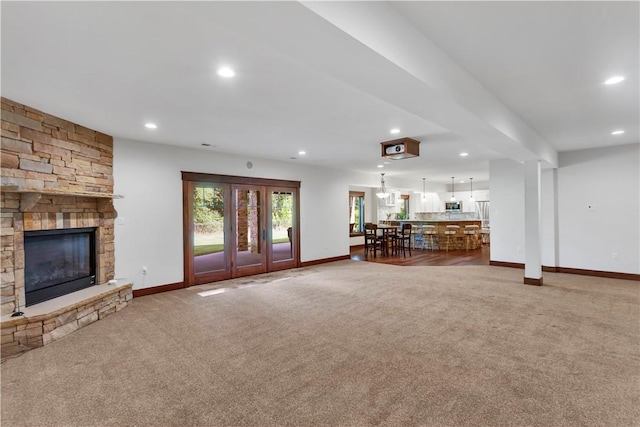 106 Orchard Dr, Pine Twp, PA 15044 - living room featuring carpet flooring, recessed lighting, and a stone fireplace