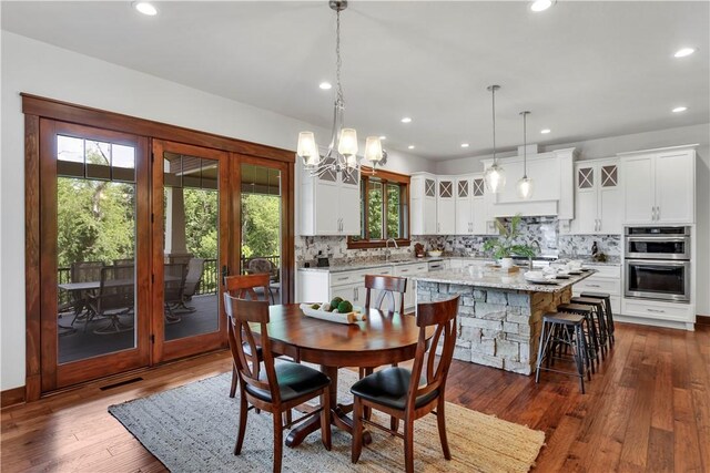 106 Orchard Dr, Pine Twp, PA 15044 - dining space with a chandelier, dark wood-type flooring, and recessed lighting