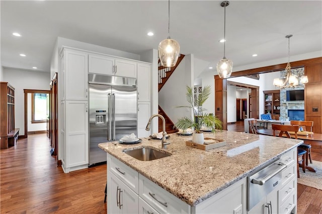 106 Orchard Dr, Pine Twp, PA 15044 - kitchen with built in refrigerator, a warming drawer, recessed lighting, decorative light fixtures, and open floor plan