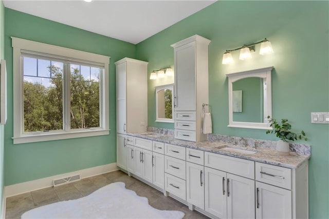 106 Orchard Dr, Pine Twp, PA 15044 - bathroom featuring double vanity and baseboards