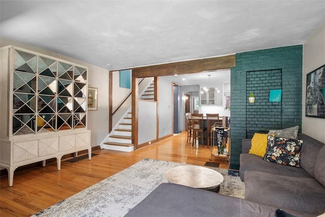 5671 Beacon St, Squirrel Hill, PA 15217 - living area with wood finished floors and stairway