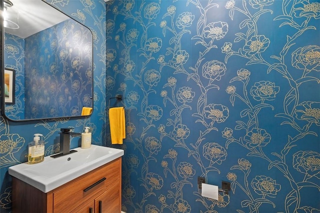5671 Beacon St, Squirrel Hill, PA 15217 - half bathroom featuring wallpapered walls and vanity