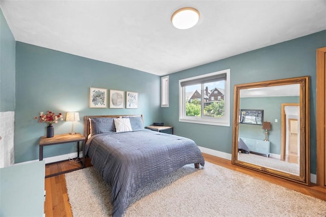5671 Beacon St, Squirrel Hill, PA 15217 - bedroom with wood finished floors and baseboards