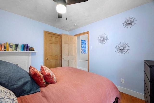 5671 Beacon St, Squirrel Hill, PA 15217 - bedroom with wood finished floors and a ceiling fan