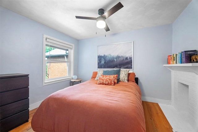 5671 Beacon St, Squirrel Hill, PA 15217 - bedroom featuring wood finished floors and a ceiling fan