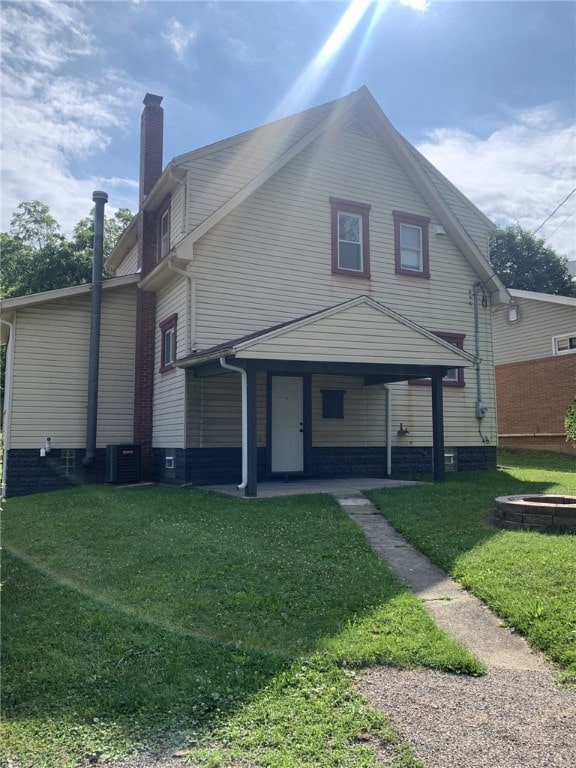 1101 State Route 356, Allegheny Twp, PA 15656 - view of front of property featuring a front lawn and a chimney