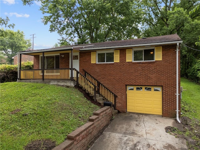 260 Stotler Rd, Penn Hills, PA 15235 - view of front of home with an attached garage, a front yard, concrete driveway, a porch, and brick siding