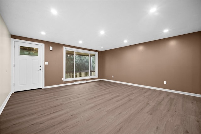 260 Stotler Rd, Penn Hills, PA 15235 - unfurnished living room with wood finished floors and recessed lighting