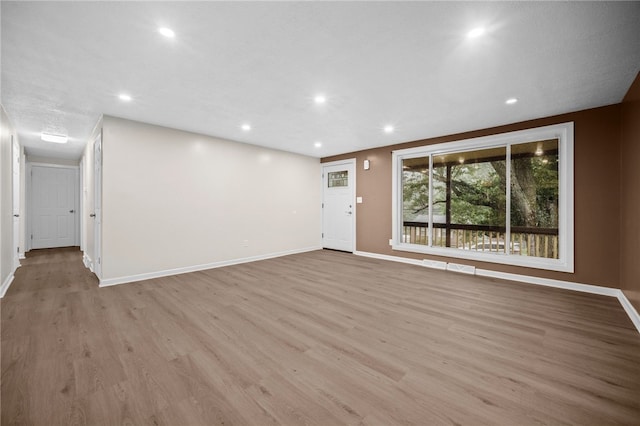 260 Stotler Rd, Penn Hills, PA 15235 - unfurnished living room featuring wood finished floors and recessed lighting