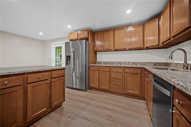 260 Stotler Rd, Penn Hills, PA 15235 - kitchen featuring stainless steel refrigerator with ice dispenser, dishwashing machine, light wood-style floors, brown cabinets, and recessed lighting