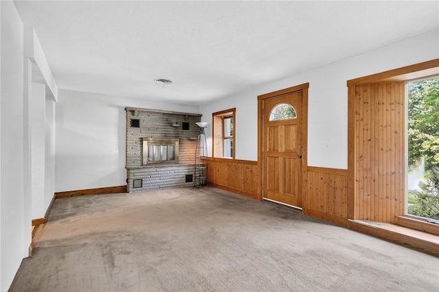 3650 Gibsonia Rd, Richland, PA 15044 - unfurnished living room featuring carpet flooring, wooden walls, and a wainscoted wall