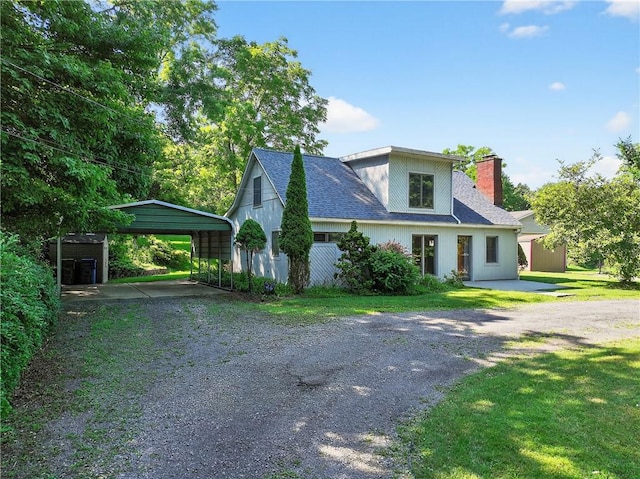 3650 Gibsonia Rd, Richland, PA 15044 - view of front of property featuring driveway, a chimney, a detached carport, and a front lawn