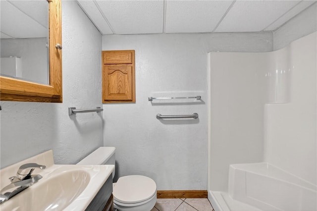 3650 Gibsonia Rd, Richland, PA 15044 - bathroom featuring a shower, tile patterned flooring, vanity, and a paneled ceiling