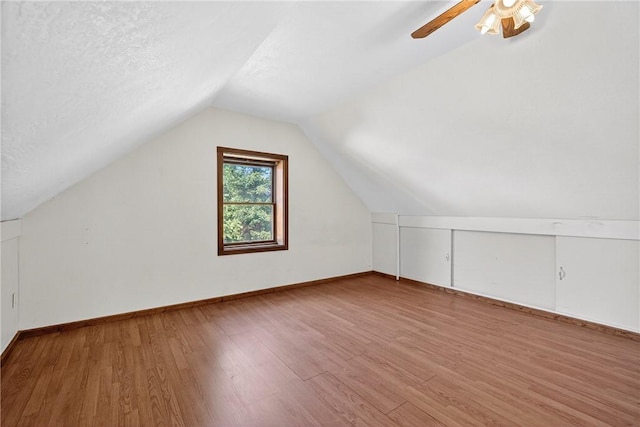 3650 Gibsonia Rd, Richland, PA 15044 - bonus room featuring wood finished floors, vaulted ceiling, and ceiling fan