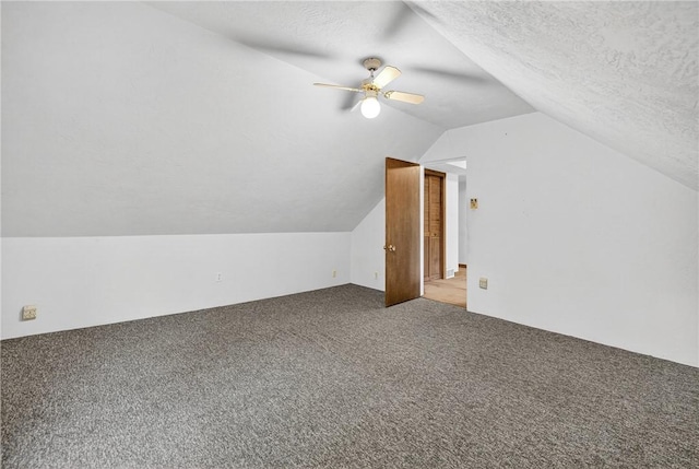 3650 Gibsonia Rd, Richland, PA 15044 - bonus room with carpet floors, vaulted ceiling, a ceiling fan, and a textured ceiling