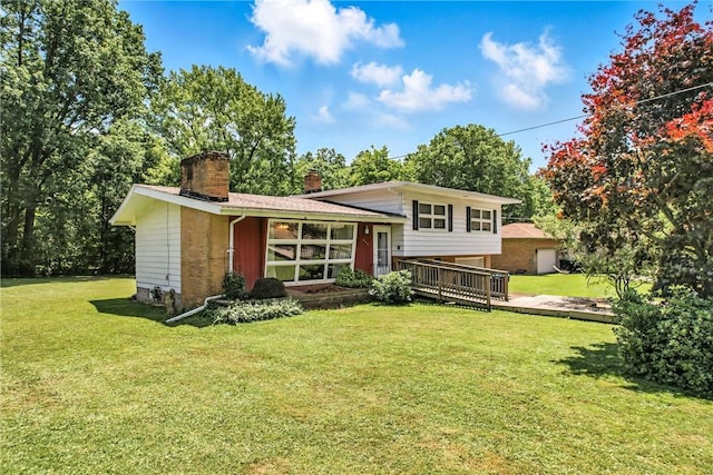 469 Koonce Rd, Hermitage, PA 16148 - back of house with a chimney, a lawn, and a deck