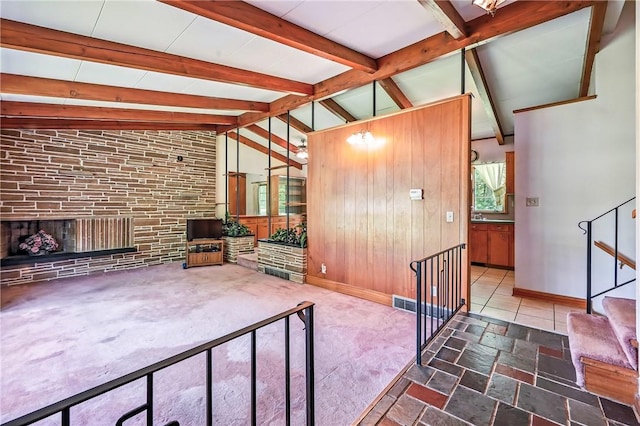 469 Koonce Rd, Hermitage, PA 16148 - living area with stairway, a fireplace, and wood walls