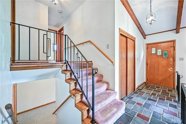469 Koonce Rd, Hermitage, PA 16148 - entrance foyer featuring vaulted ceiling, stairway, and dark stone finish floors