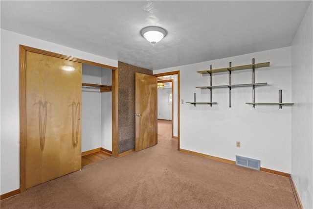 719 12th St, Pitcairn, PA 15140 - unfurnished bedroom featuring carpet and a closet