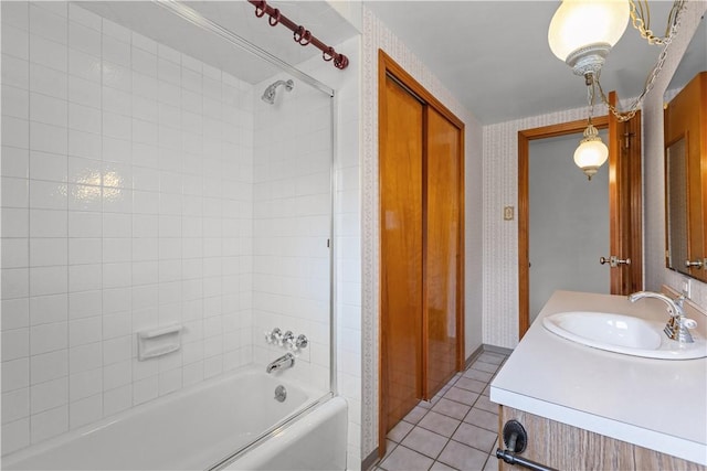 719 12th St, Pitcairn, PA 15140 - full bath featuring wallpapered walls, shower / tub combination, vanity, and tile patterned floors