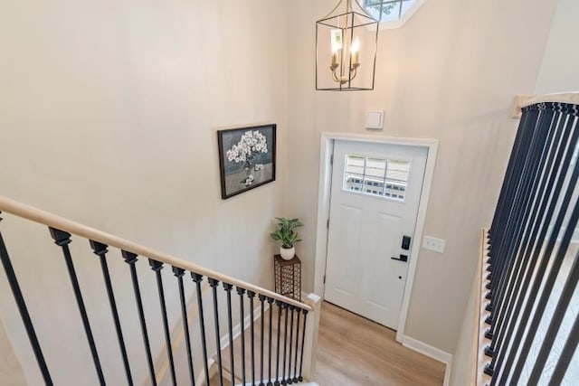 3415 Cedar Glen Dr, West Deer, PA 15101 - foyer with a chandelier, light wood-type flooring, plenty of natural light, stairway, and a high ceiling