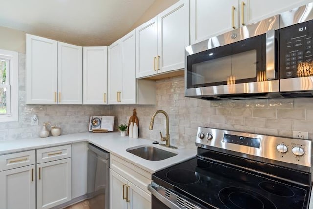 3415 Cedar Glen Dr, West Deer, PA 15101 - kitchen with appliances with stainless steel finishes, white cabinetry, light countertops, and backsplash