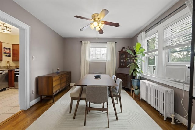 210 Ridge Ave, Ben Avon, PA 15202 - dining room with radiator, a ceiling fan, light wood finished floors, and cooling unit