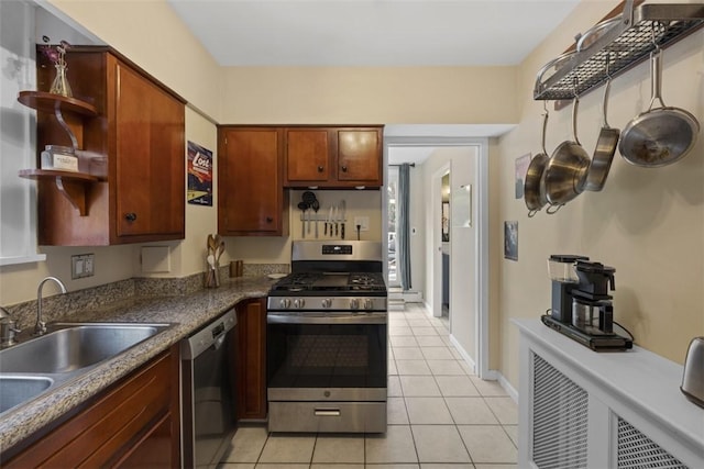 210 Ridge Ave, Ben Avon, PA 15202 - kitchen featuring gas stove, dishwasher, open shelves, light tile patterned floors, and dark countertops