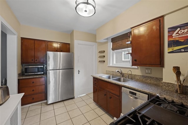 210 Ridge Ave, Ben Avon, PA 15202 - kitchen featuring appliances with stainless steel finishes and light tile patterned flooring