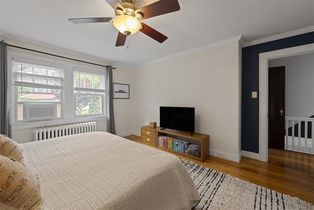 210 Ridge Ave, Ben Avon, PA 15202 - bedroom with radiator heating unit, wood finished floors, crown molding, and a ceiling fan