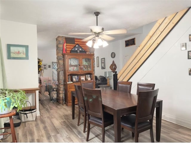 811 Cleveland Ave, Brackenridge, PA 15014 - dining area with a ceiling fan, wood finished floors, and stairway