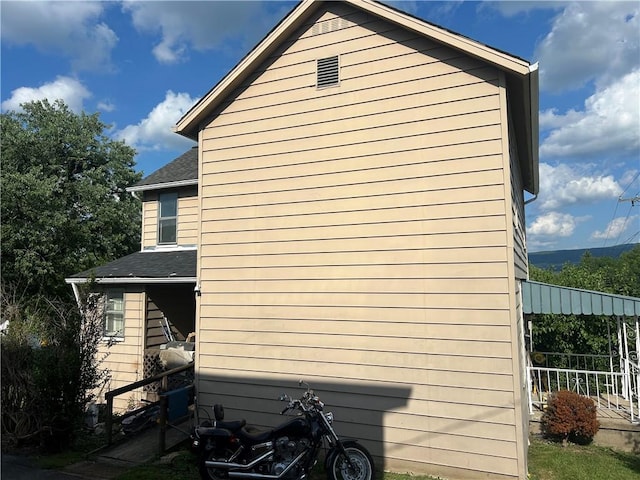 25 E Craig St, Uniontown, PA 15401 - view of property exterior featuring roof with shingles