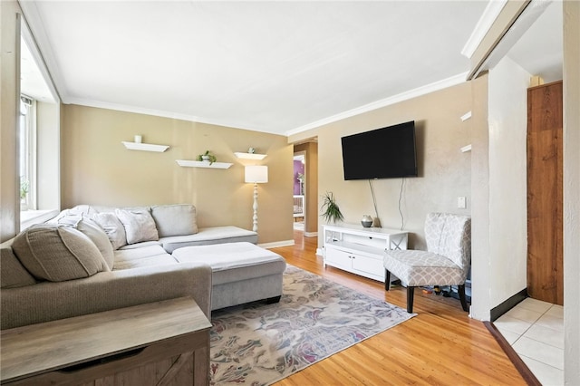 639 Blossom Dr, Baldwin Boro, PA 15236 - living area featuring light wood finished floors and crown molding