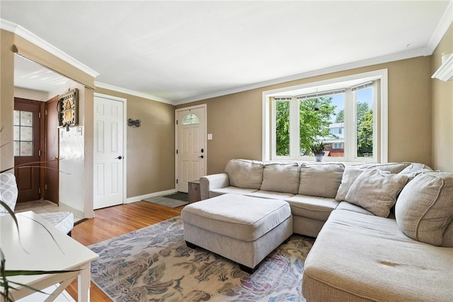 639 Blossom Dr, Baldwin Boro, PA 15236 - living area featuring light wood finished floors and ornamental molding