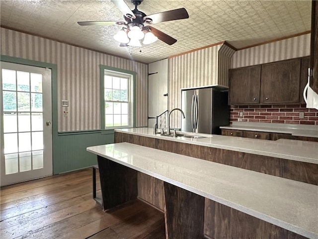 328 Thatcher Rd, Fairfield Twp, PA 15944 - kitchen featuring freestanding refrigerator, an ornate ceiling, light countertops, dark brown cabinetry, and hardwood / wood-style floors