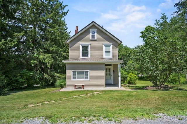 102 Clarks Ln, Adams Twp, PA 16046 - view of front of home featuring a front yard and a patio area