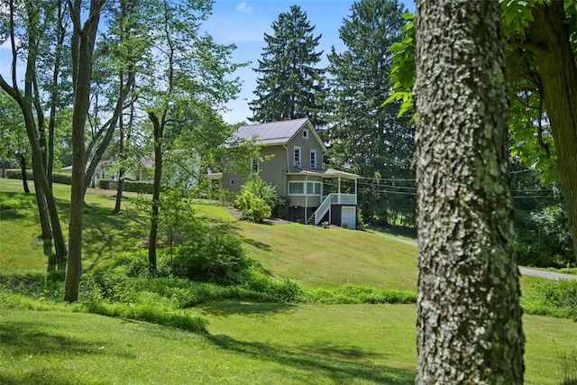 102 Clarks Ln, Adams Twp, PA 16046 - view of grassy yard with stairway and an attached garage