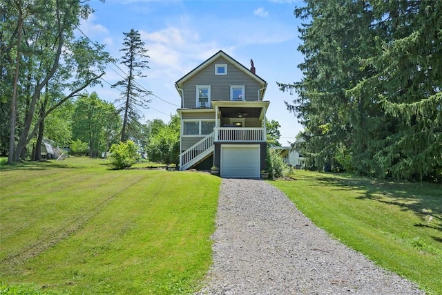 102 Clarks Ln, Adams Twp, PA 16046 - view of front of property with stairway, driveway, a front lawn, and a chimney