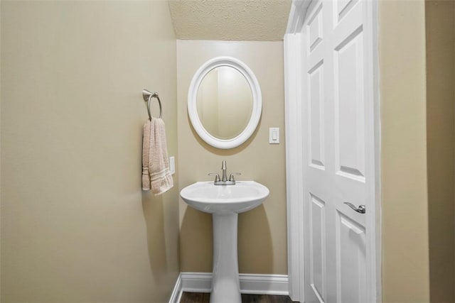 102 Clarks Ln, Adams Twp, PA 16046 - bathroom featuring a textured ceiling and baseboards