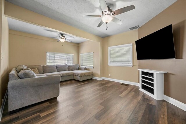 102 Clarks Ln, Adams Twp, PA 16046 - living room with ceiling fan and dark wood finished floors